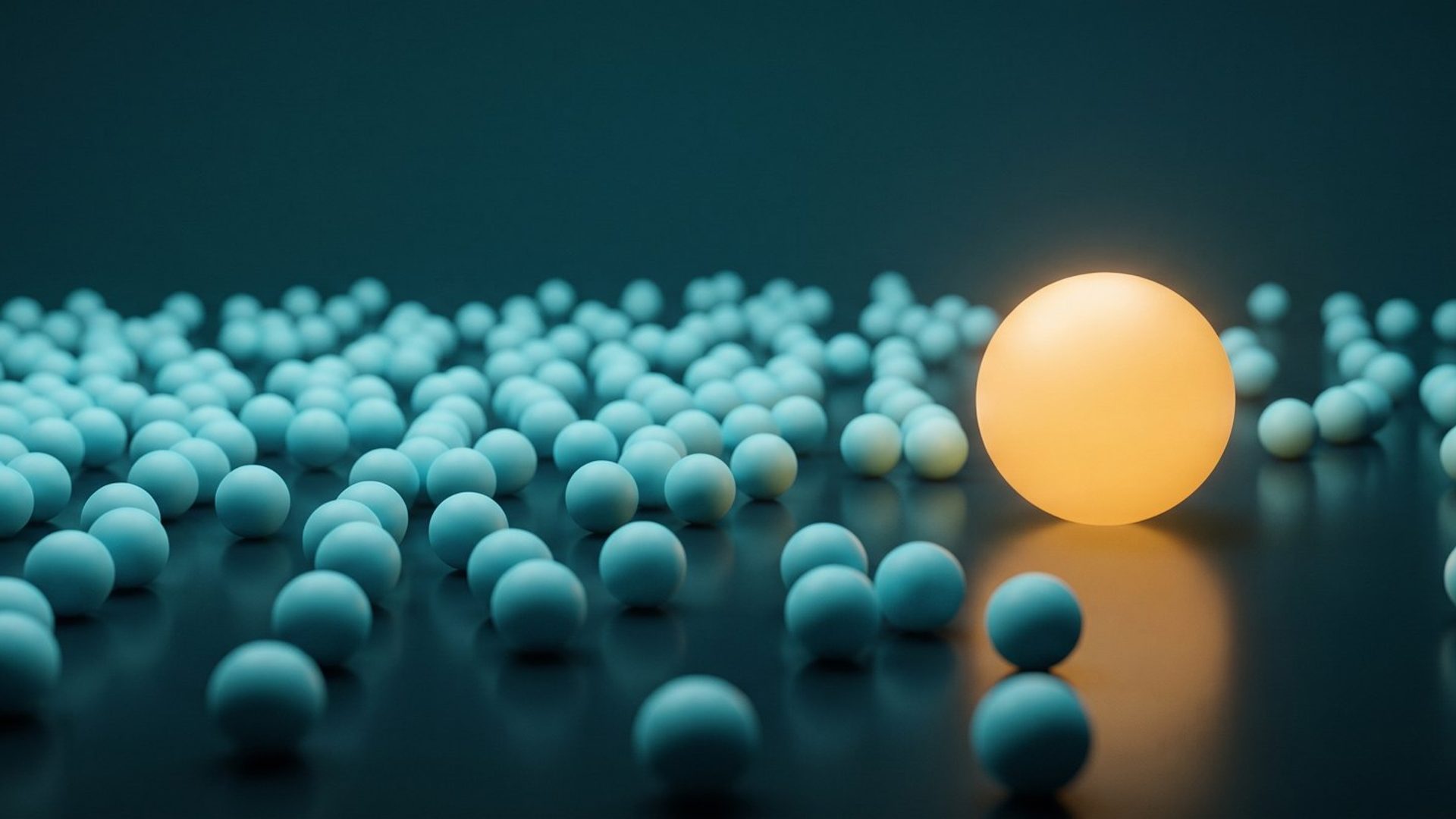 A field of small cool blue spheres on a dark surface, with one larger glowing warm amber sphere set apart from the rest.