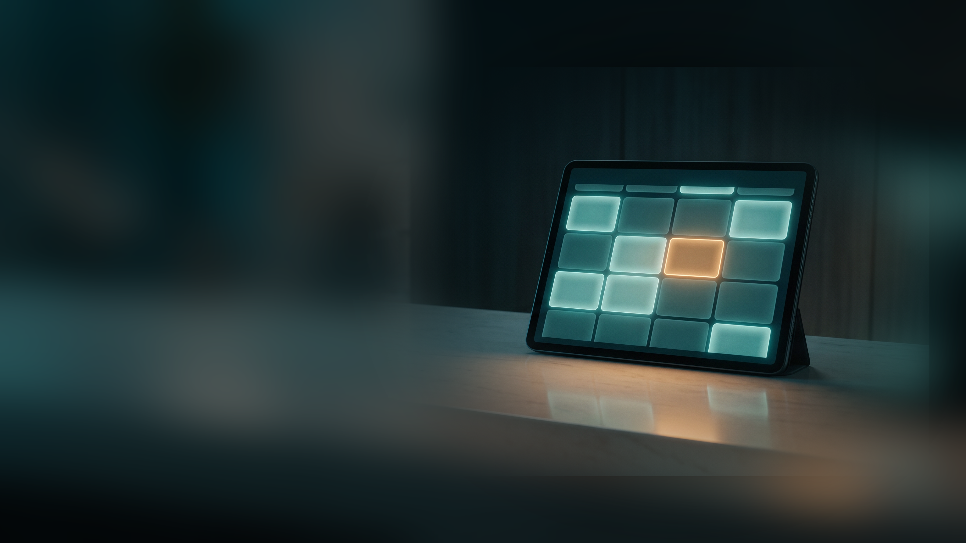A tablet on a reception counter showing an appointment calendar, one newly booked time slot glowing amber