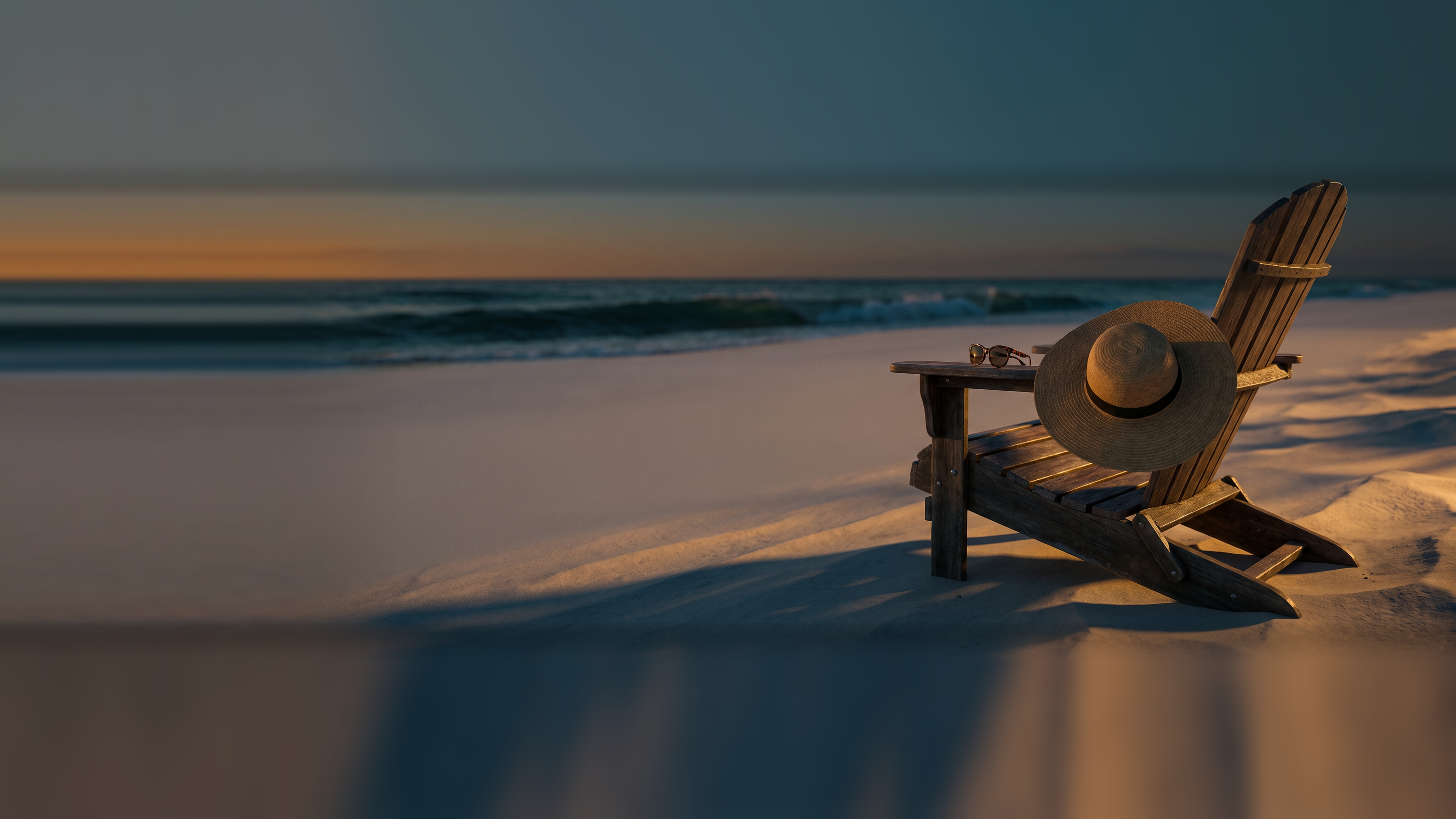 A wide-brimmed straw sun hat and sunglasses resting on an empty wooden beach chair at golden hour, surf behind