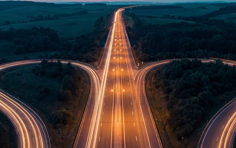 Three separate roads merging into one lit highway - LinkedIn, Google, and Meta run together, not as rivals.