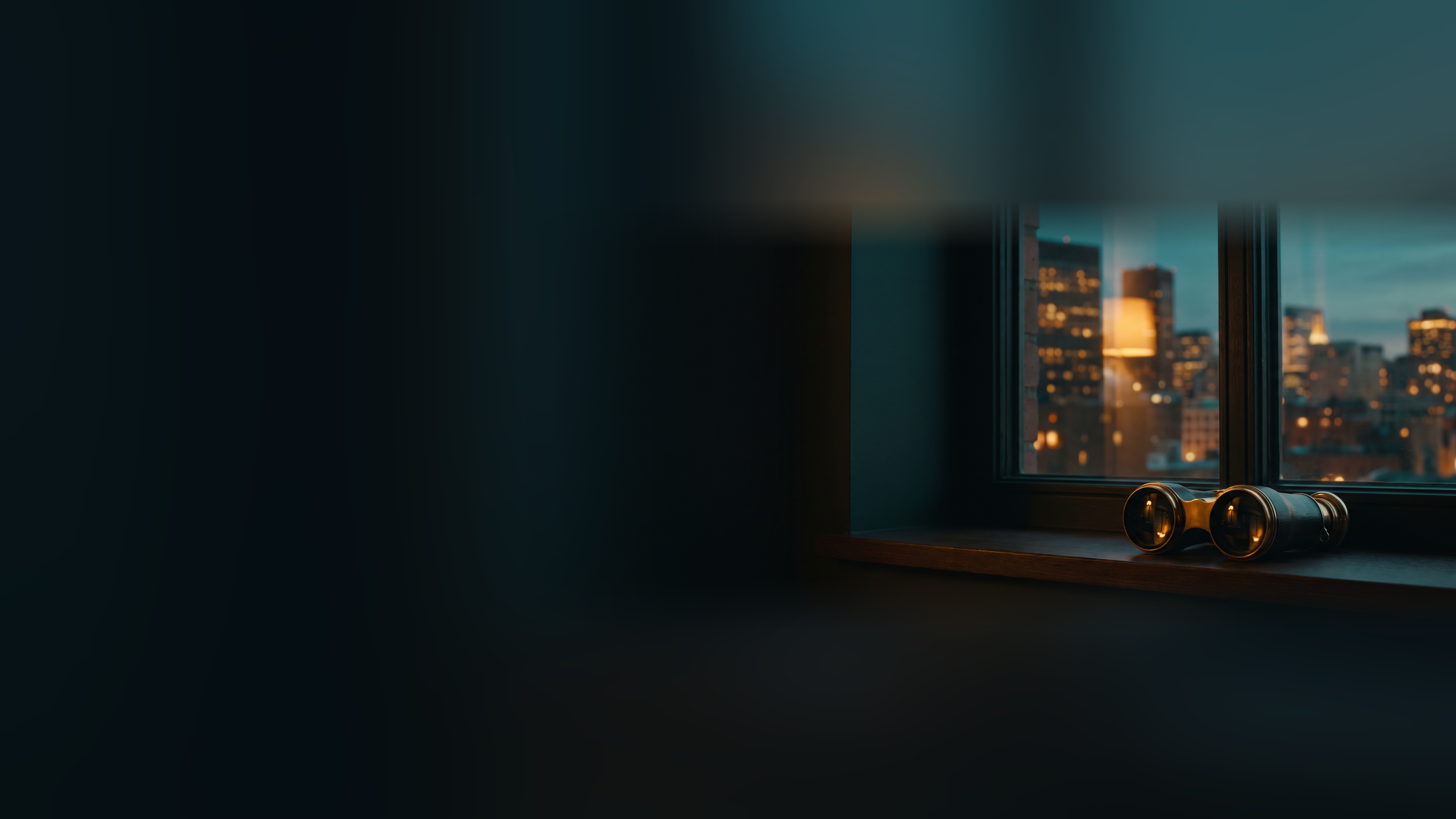 Brass binoculars on a dark windowsill facing a lit city skyline at dusk