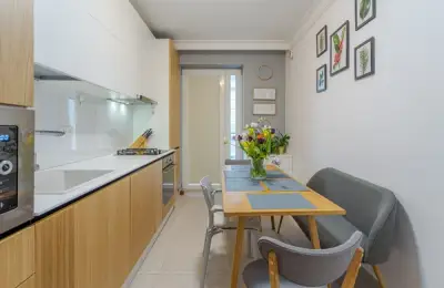 Modern Design with Classic Accents and Pops of Color in a 4-Bedroom Bucharest Apartment