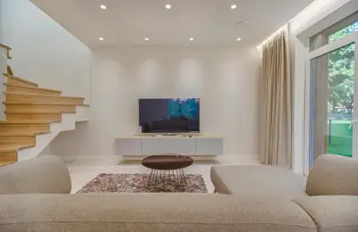 How to Arrange Lighting Fixtures to Make a Living Room Look Larger