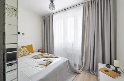 Functional Repurposing and Trendy Interior Design for a One-Bedroom Apartment