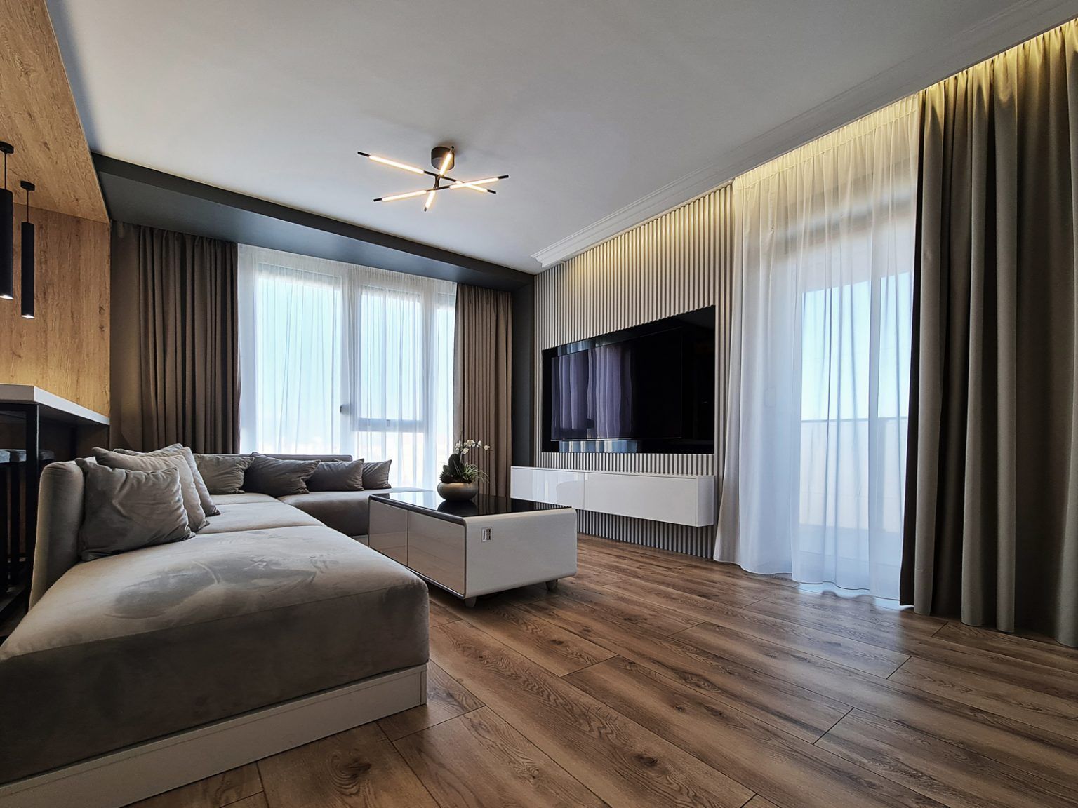 Three-Bedroom Apartment Design in a Contemporary Style with Many Wood Accents