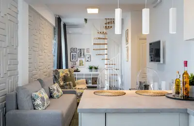 Chromatic and Textural Mix for a Modern Duplex in Bucharest