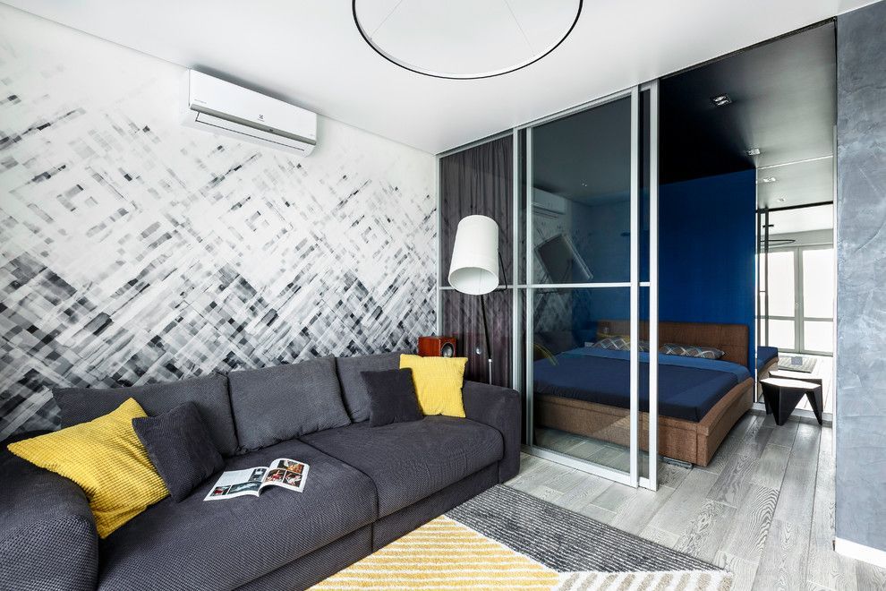 Decor modern cu integrarea ingenioasa a unui spatiu de dormit