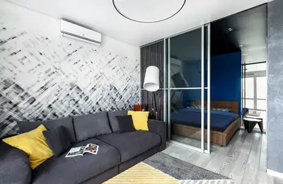 Modern Decor with Ingenious Integration of a Sleeping Space
