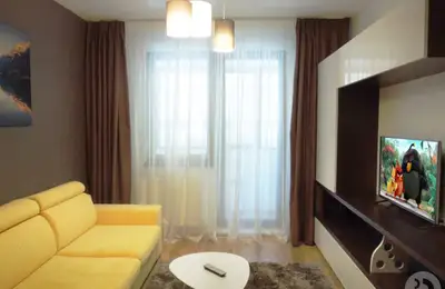 Practical and Functional Design of a Two-Bedroom Apartment in Bucharest