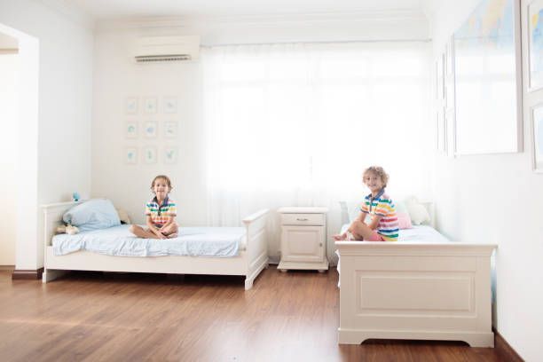 Amenajarea camerei pentru gemeni: un spațiu confortabil pentru doi