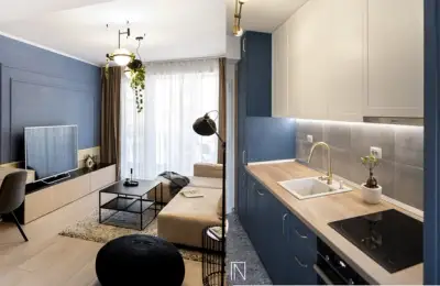 The Story of a Two-Bedroom Apartment Decorated in Neutral, Earthy Tones with Blue Accents