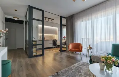 A Modern Bucharest Apartment with Glam and Industrial Accents