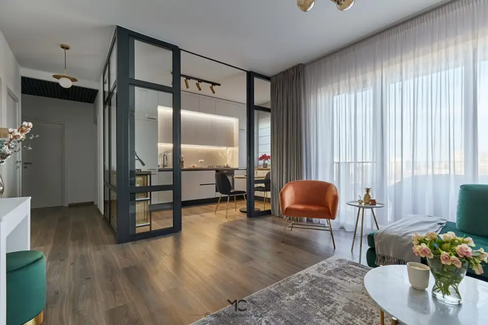 A Modern Bucharest Apartment with Glam and Industrial Accents