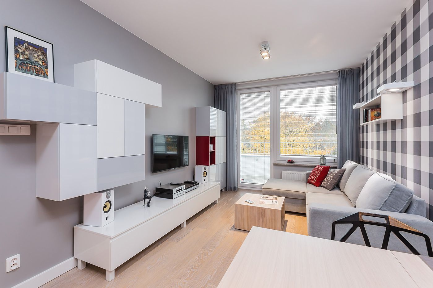 Modern Apartment for a Young Person with Red Touches