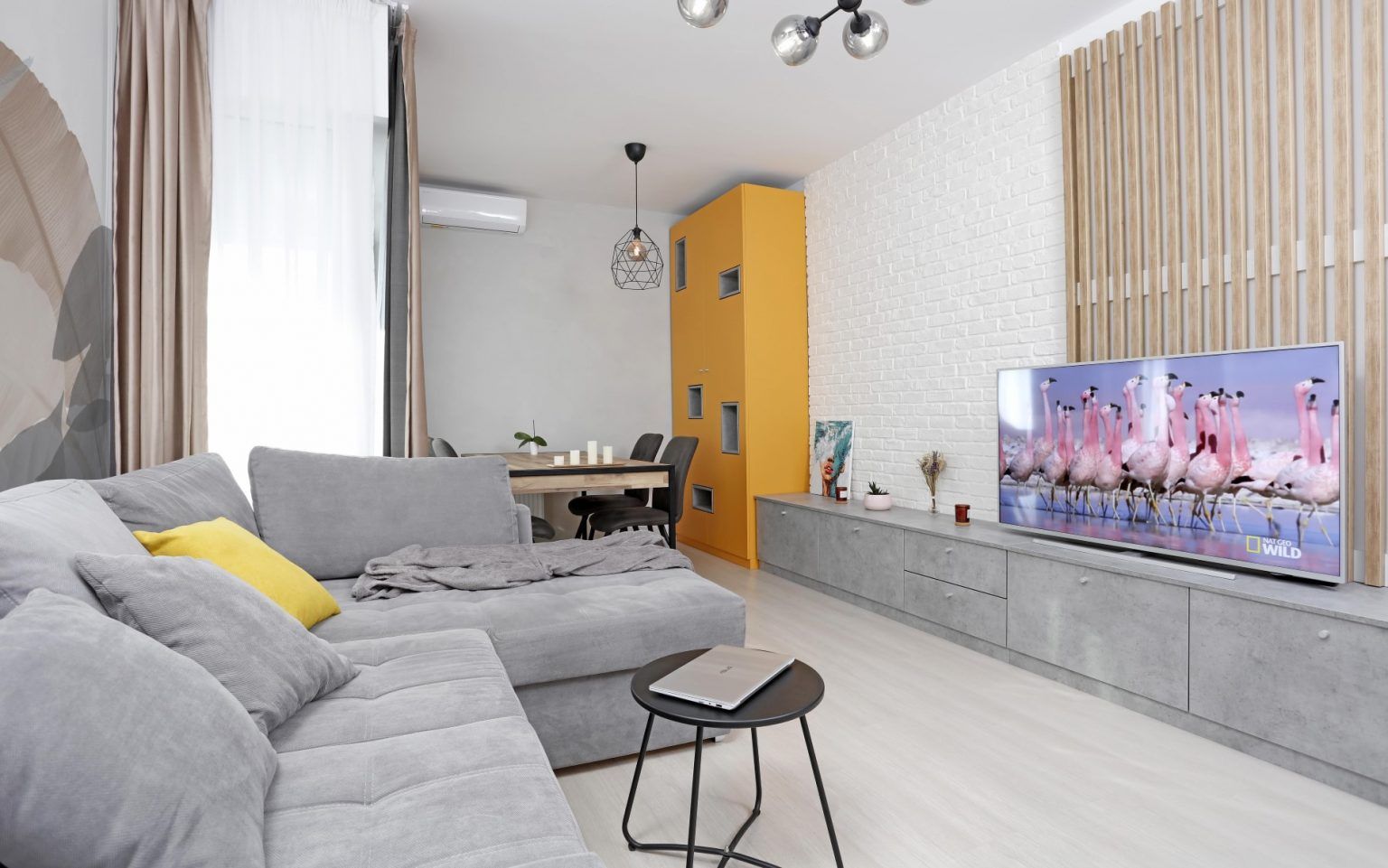 Modern and Bright 3-Bedroom Apartment Design in Bucharest with Gray Tones
