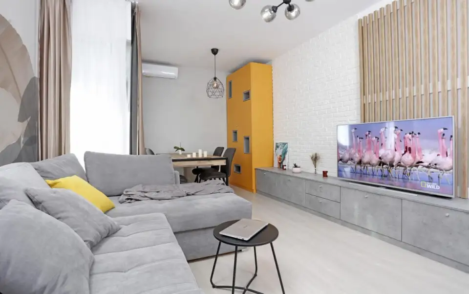 Modern and Bright 3-Bedroom Apartment Design in Bucharest with Gray Tones