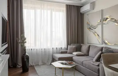 Elegant Design for a Three-Bedroom Apartment: Taming Irregular Compartmentalization