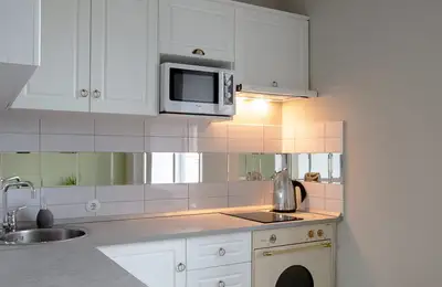 Renovation and Design of a 31 sq m Apartment with Pastel Color Accents