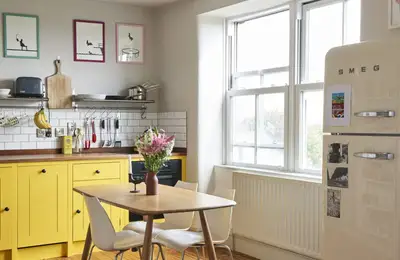 Kitchen with Yellow Detail in a London Apartment