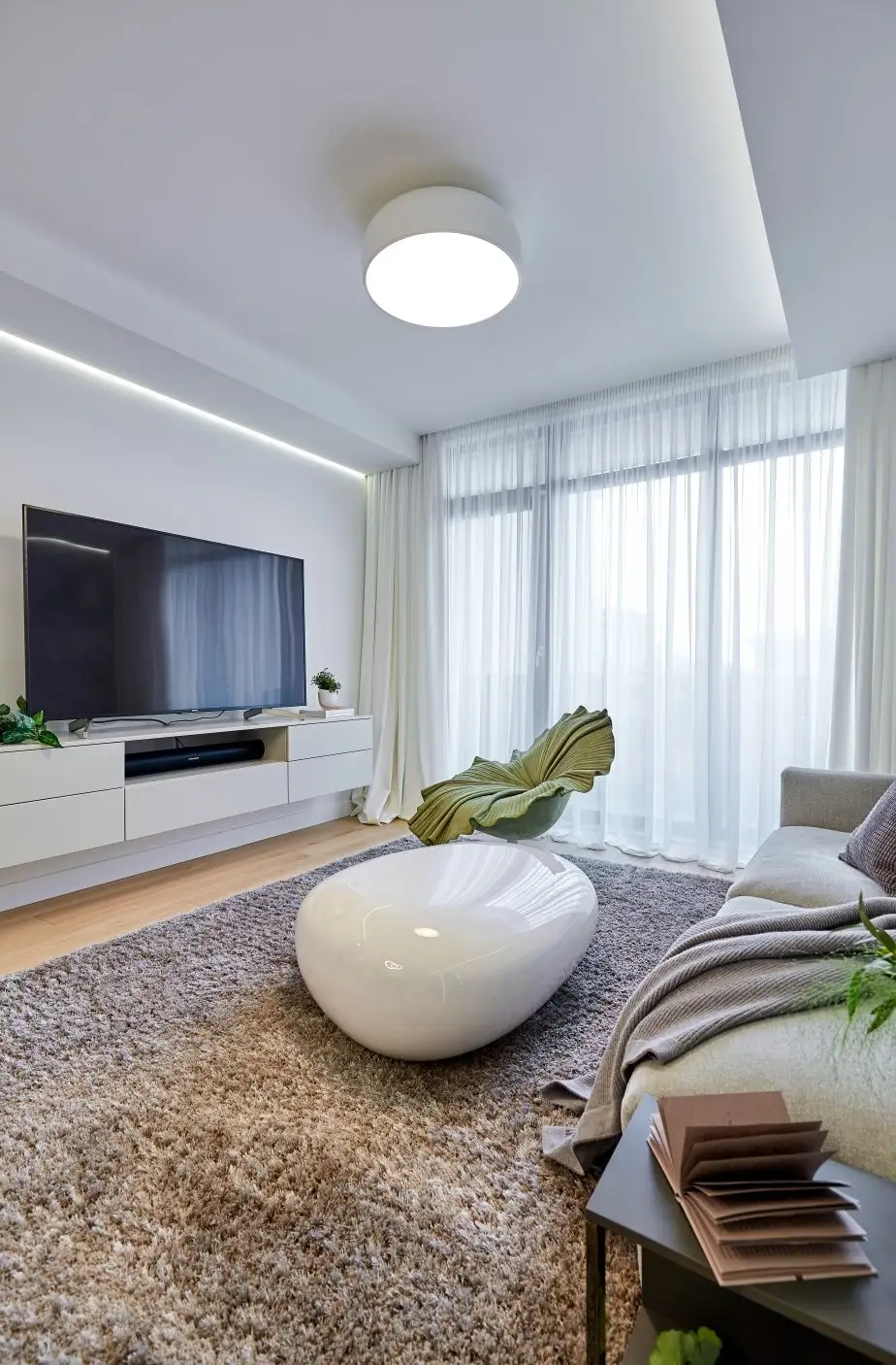 Natural Elegance in a 3-Room Design: Lots of Wood and Warm Gray Tones