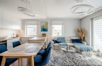 Modern Three-Bedroom Apartment with Wood Accents and Blue Highlights