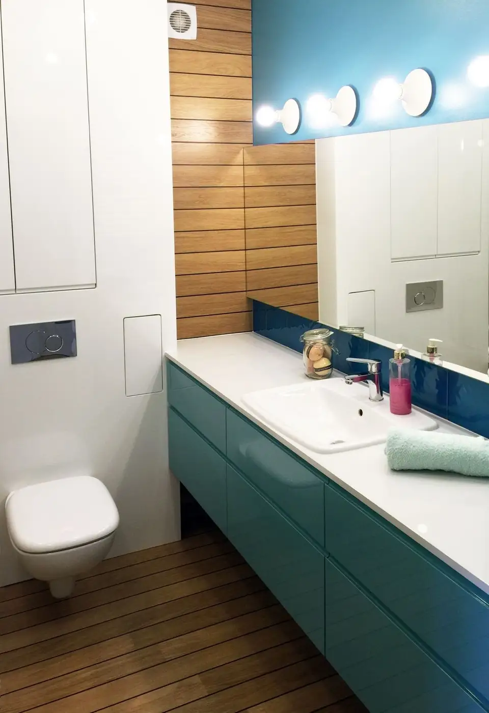 A Bathroom Remodel with Navy Blue Accents