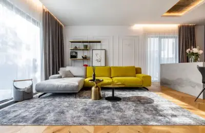 Lemon Yellow Accents and Exposed Concrete in a Modern Duplex in Otopeni