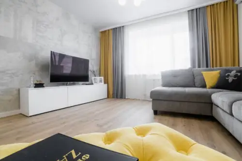 Abordare moderna intr-un apartament de 4 camere pentru un cuplu tanar