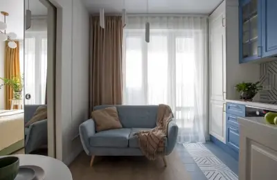 Elegance and Comfort in Just 39 sqm: Design with Blue Accents