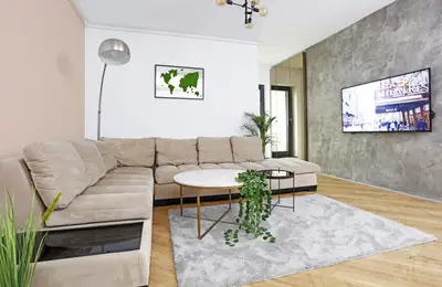 Modern Three-Bedroom Apartment with Neutral Decor
