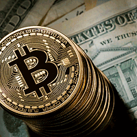 Valoarea bitcoin aproape că s-a dublat faţă de anul trecut
