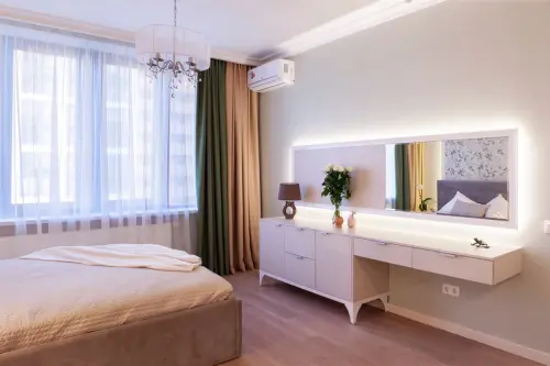 Accente feminine in amenajarea unui apartament de 2 camere pentru o familie cu 3 membri