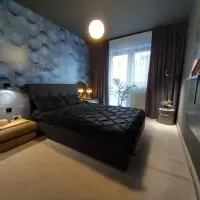 Amenajare cu influente industriale pentru un apartament de 49 mp