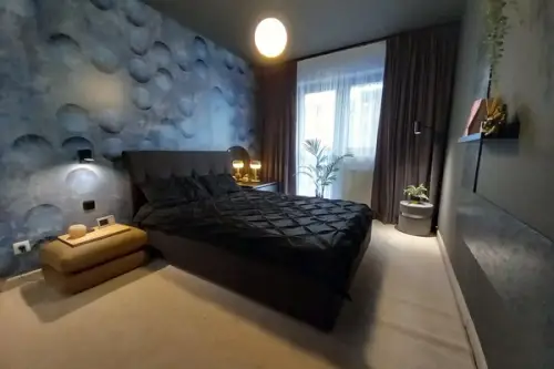 Amenajare cu influente industriale pentru un apartament de 49 mp