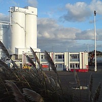 Holcim, Romcim și Heidelberg sancționați de Concurență pentru înțelegere pe prețuri