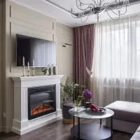 Nuante calde de violet in redecorarea unui apartament de 3 camere