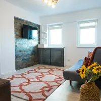 Amenajare inspirata de nuantele naturii intr-un apartament din Bucuresti