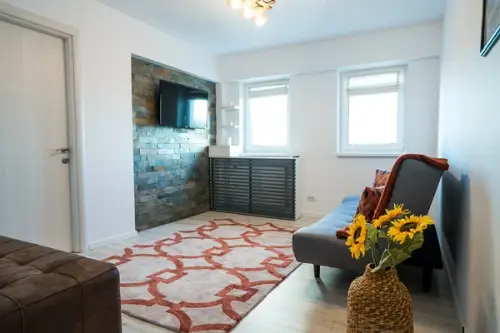 Amenajare inspirata de nuantele naturii intr-un apartament din Bucuresti