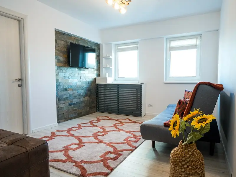 Amenajare inspirata de nuantele naturii intr-un apartament din Bucuresti