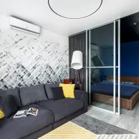 Decor modern cu integrarea ingenioasa a unui spatiu de dormit