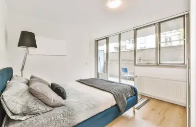 Lighting a Small, Dark Bedroom with Color