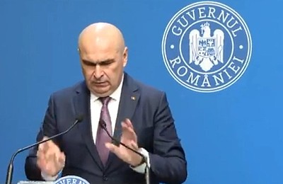 Bolojan crește TVA, taie bursele școlare și taxează pensiile (VIDEO)