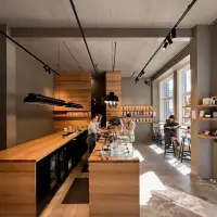 The Barn: O poveste de transformare dintr-un grajd într-o cafenea urbană