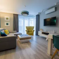 Amenajare scandinava cu accente moderne dedicata unei familii complete