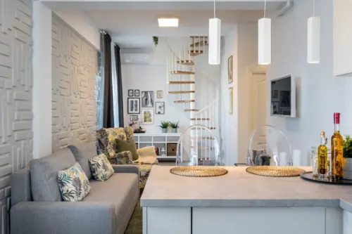 Mix cromatic si textural pentru un duplex modern din Bucuresti