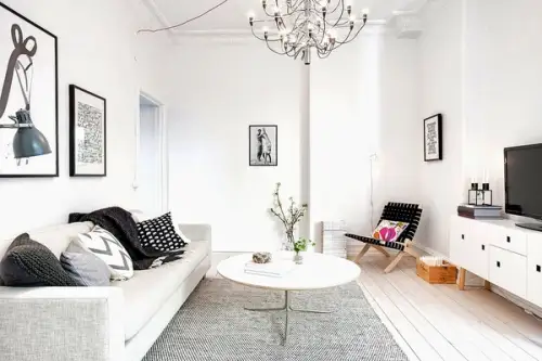 Apartament scandinav o amenajare monocromatica cu detalii artistice