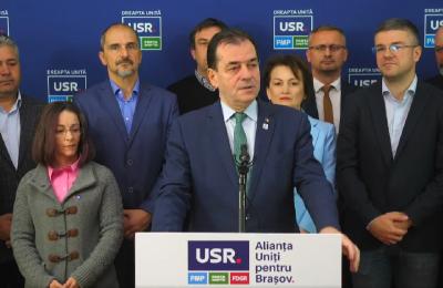 Ludovic Orban, la Brașov, cu referire la fostul lui coleg de partid, Adrian Veștea: „Cine se duce în Guvern să fie subalternul lui Ciolacu și al PSD-ului nu este liberal adevărat. Am garanția că omul care nu va părăsi brașovenii este Irineu Darău”. La Brașov, „mergeți cu Allen Coliban!”