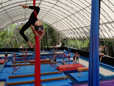 camper on the silks in the aerials program at Canadian Adventure Camp