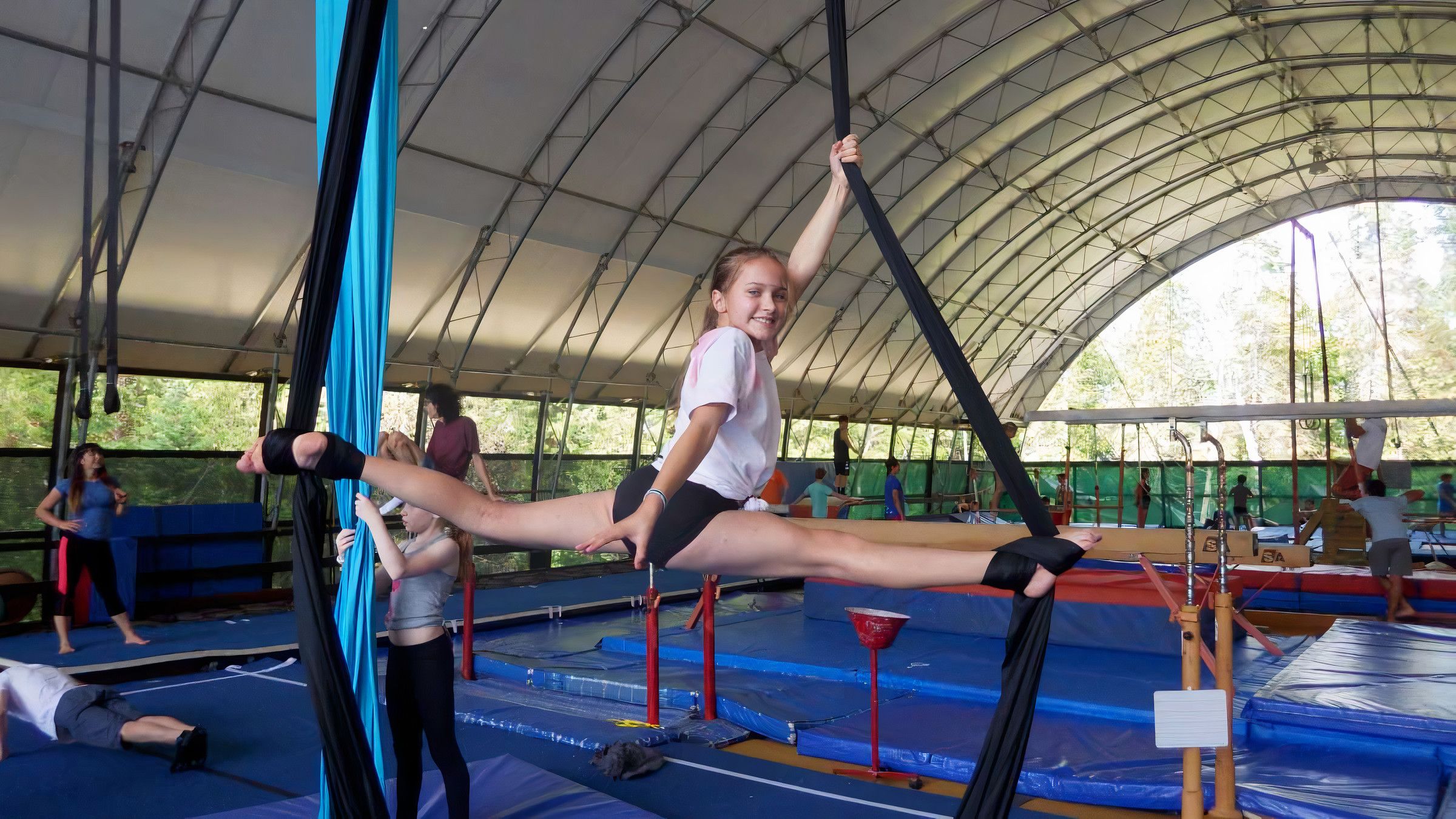 camper on the silks in the aerials program at Canadian Adventure Camp