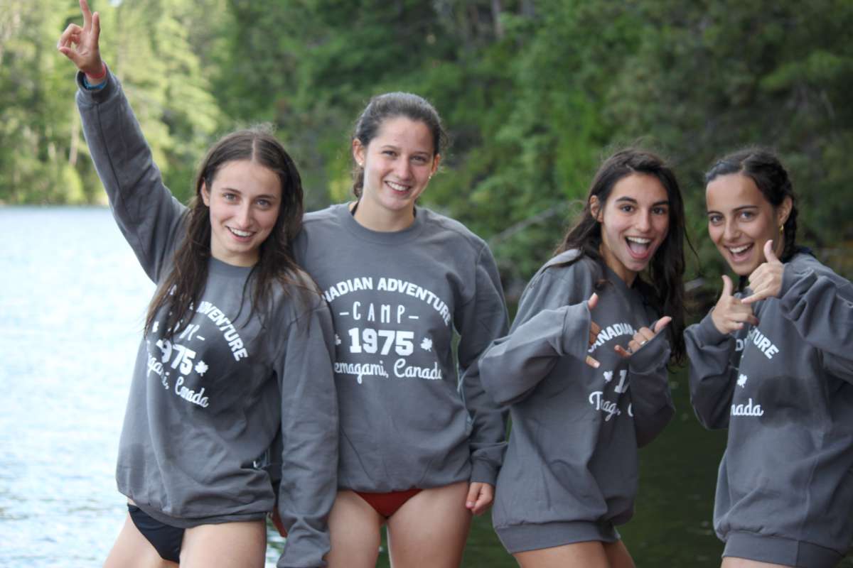 teenage girl campers smiling together at Canadian Adventure Camp